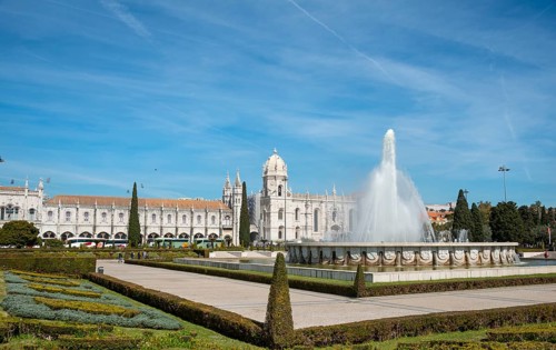 Fountain in the Jardim da Praca do Imperio with Mosteiro dos Jeronimos