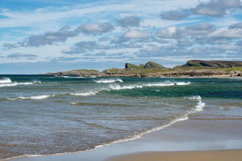 Sandy beach Saligo Bay in the west of the island of Islay