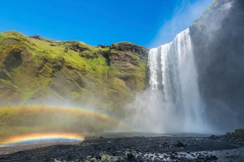 Waterfall Skogafoss with double rainbow