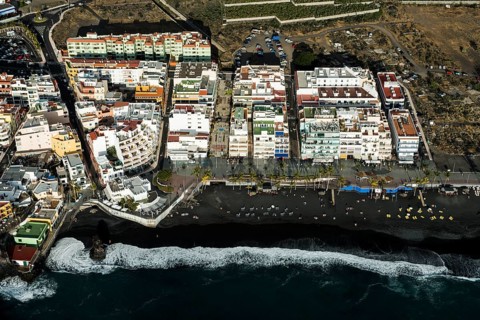 Surf on black lava beach