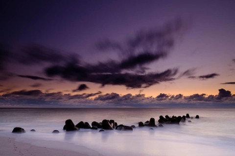 Concrete blocks as coastal protection on the beach of Hornum in the evening light