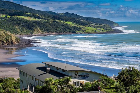 Surfers at Ngarunui Beach