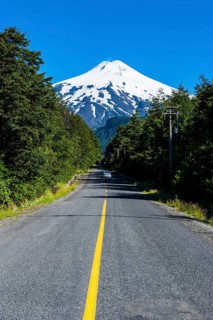 Road leading to the snowcapped volcano Villarrica