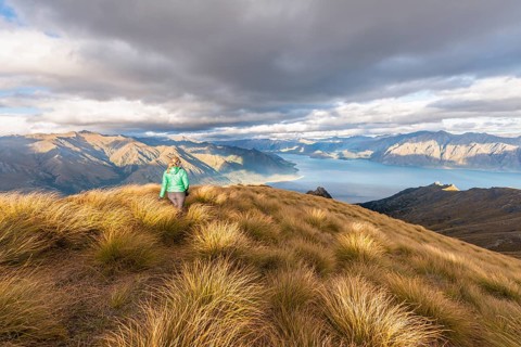 Hiking woman looking at lake