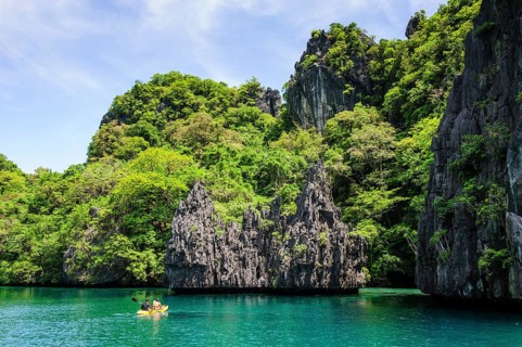 Kayaking in the crystal clear water in the Bacuit archipelago