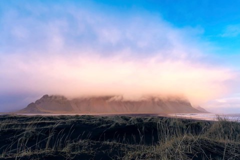 Mountain massif horn in clouds