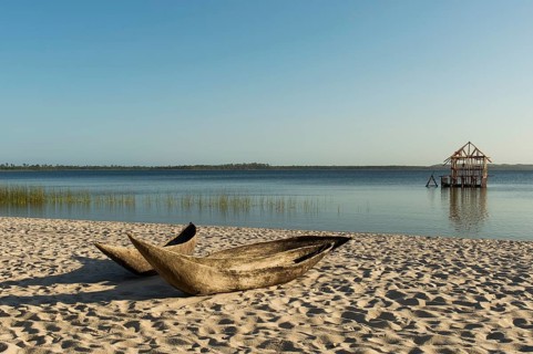 Dugout canoe on a sandy beach