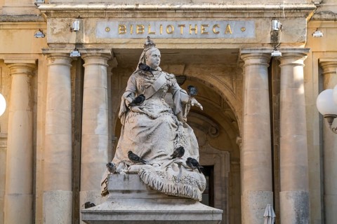 Statue of Queen Victoria in front of the public library