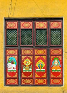 Traditional Buddhist motifs on wall