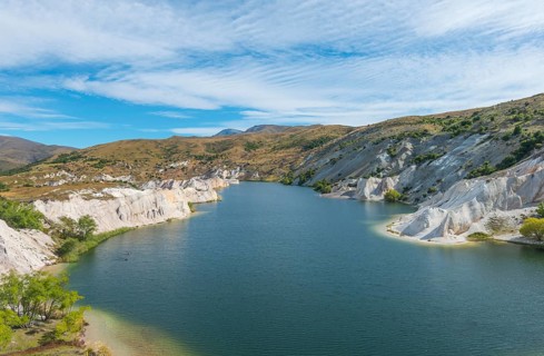 Lake surrounded by limestone cliffs