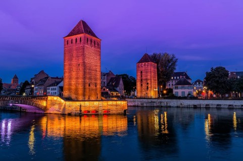 Ponts couverts over ILL Canal at sunset