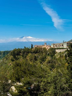 San Domenico Palace Hotel with Mount Etna