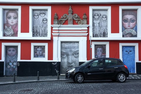 Wall of the house painted with various pictures