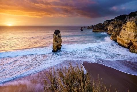 Sunrise on the beach Praia da Dona Ana