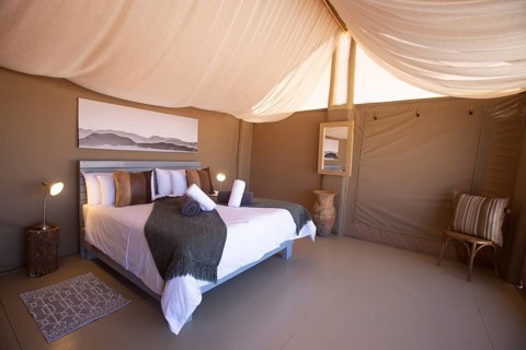 Double bed in luxury tent