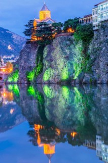 Metekhi Church on rock at Mtkvari River at dawn
