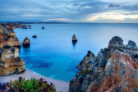 Beach and rocky coast Praia do Camilo