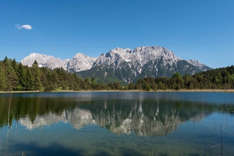Western Karwendelspitze is reflected in the Luttensee