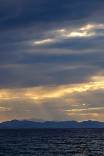 Thunderclouds at sunset on the beach