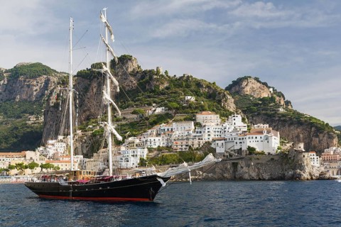 Tall ship at anchor in front of Amalfi