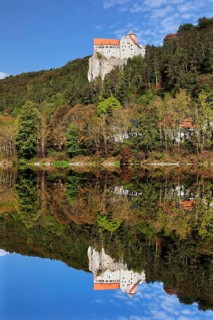 Castle Prunn reflected in the Rhine-Main-Danube Canal in Riedenburg