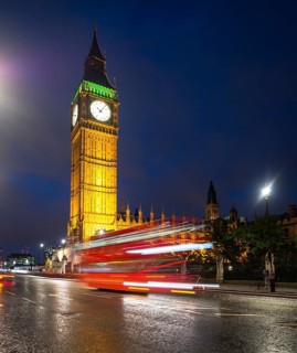 Red double-decker bus in front of Big Ben