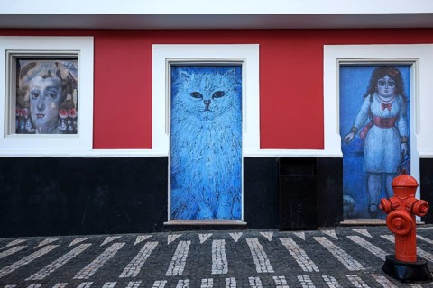 Wall of the house painted with various pictures