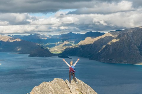 Female hiker on a rock