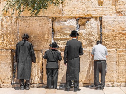 Praying Orthodox Jews at the Wailing Wall