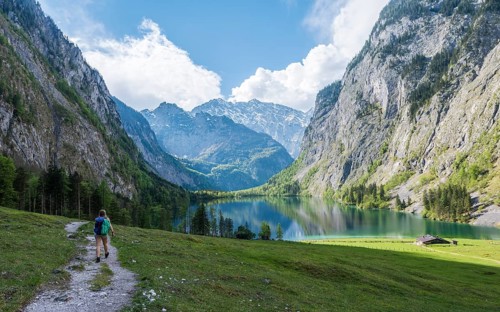 Hiker on trail to Lake Obersee