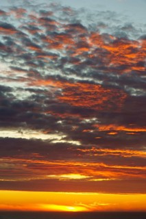 Shining sky over the Pacific Ocean at sunset