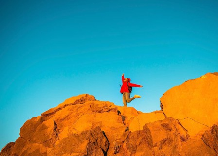 Young woman jumping in the air
