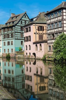 Timbered Houses reflecting in the ILL canal along the Quai de la Petite France