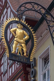 Hanging shop sign of the Gasthof Zum Riesen
