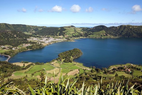 View from Miradouro do Cerrado das Freiras into the volcanic crater Caldera Sete Cidades with the crater lake Lago Azul