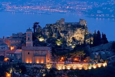 Flood-lit village with church