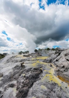 Steaming Pohutu Geyser and Prince of Wales Feathers Geyser