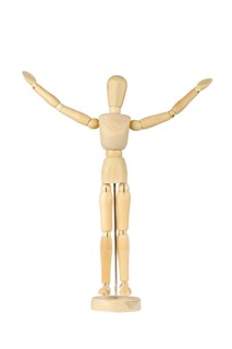 Wooden stickman with arms raised