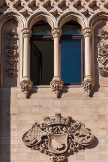 Arched windows and coats of arms