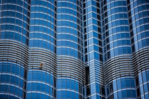 Window cleaners on glass facade of Burj Khalifa