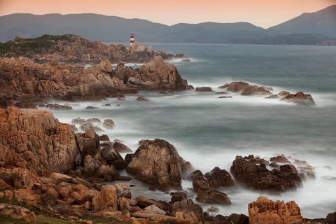 Rocky coast with lighthouse at Ganh Dia