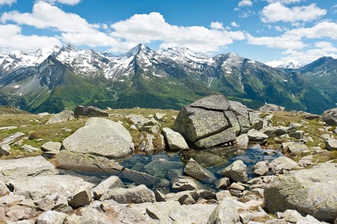 Clear water on rocks in the mountains