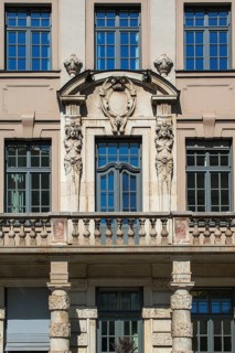 Facade with balcony and caryatids