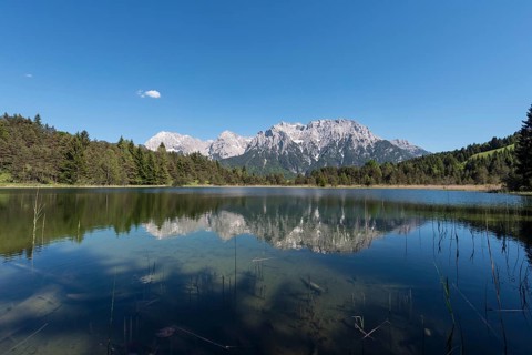 Western Karwendelspitze is reflected in the Luttensee