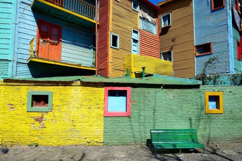 Colorfully painted houses made of corrugated sheet iron