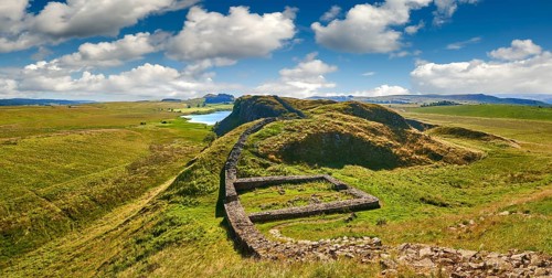 Hadrian's Wall with foundation walls of former watchtower