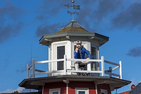 Figure of a captain on a tower