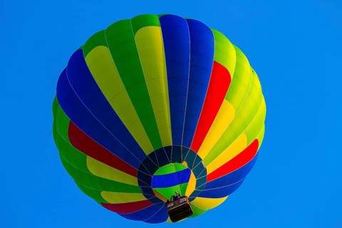 Hot air balloon in front of blue sky
