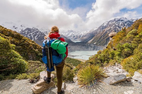 Hiker standing on rocks