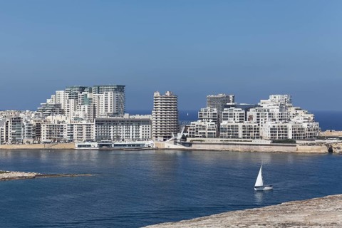 Spit of land with office and apartment buildings